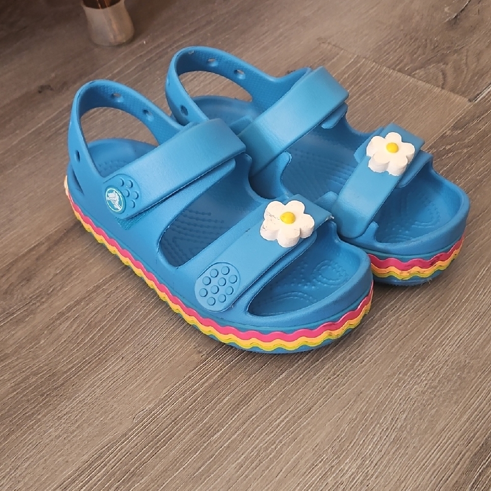 CROCS Blue Kids Sandals with White Daisy Accent and Rainbow Sole